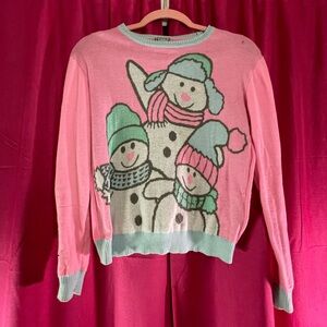 Cute Christmas sweater pink with the snowman print. Size small
